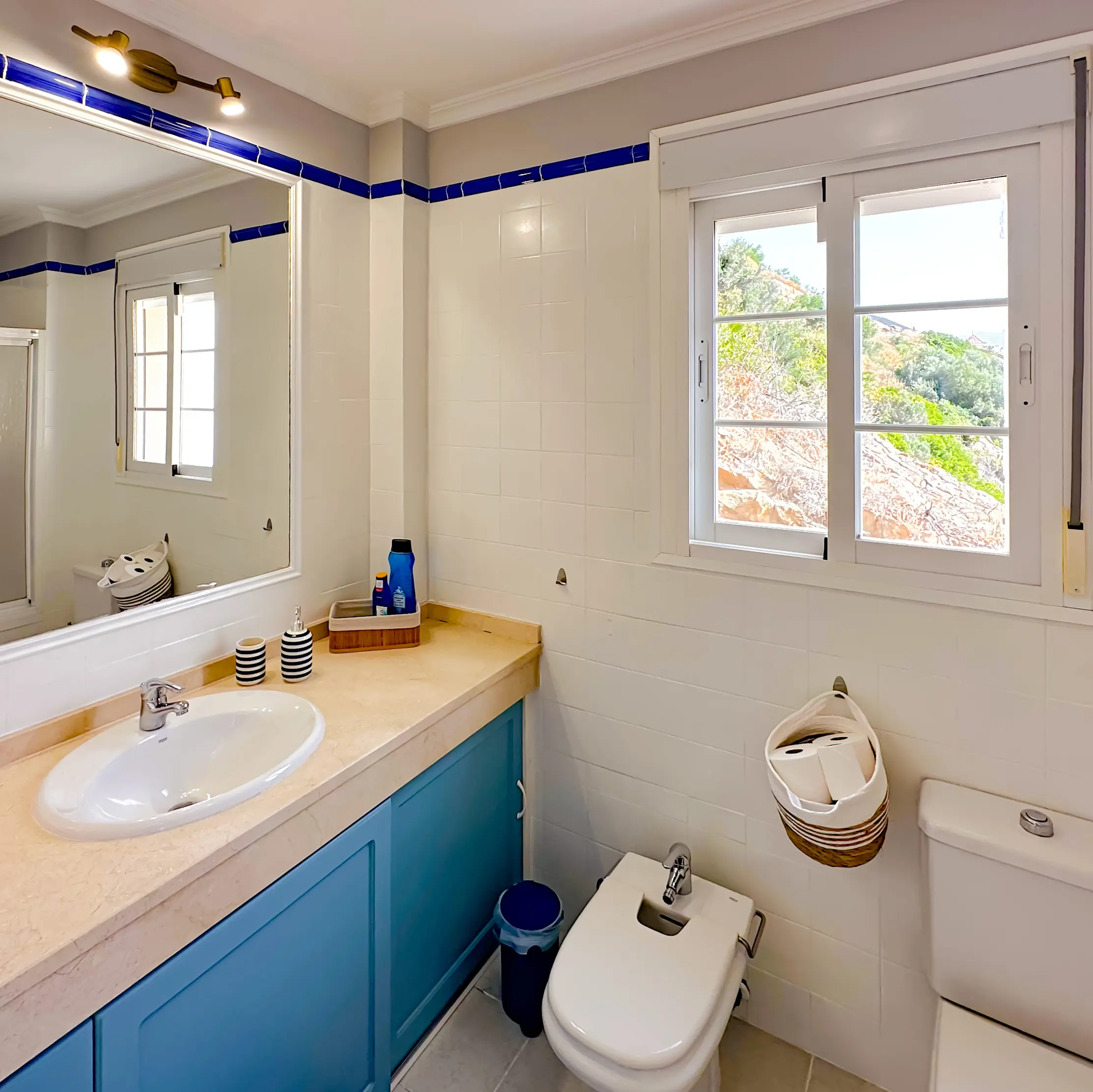 Main bathroom - Your separate bathroom, right next to the main bedroom. Features a washbasin, bidet, toilet and a bathtub-shower.